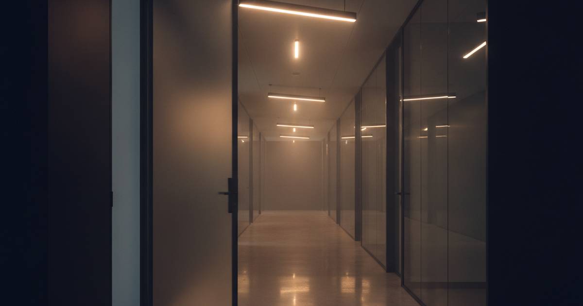 Empty office corridor at night