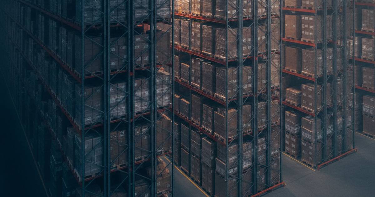 Warehouse racking receding into haze
